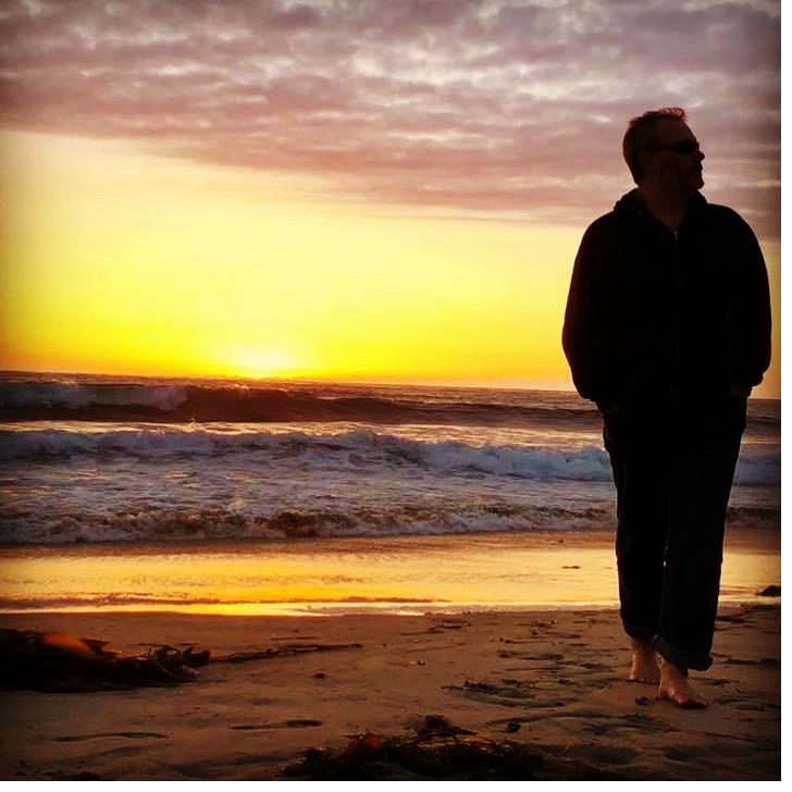 Contemplative silhouette at sunset on the beach